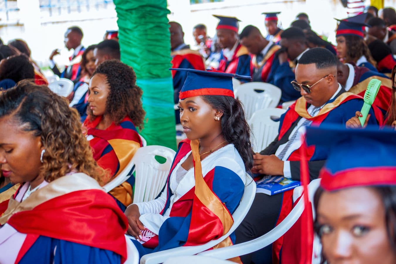 Students sitting together at a graduation ceremony