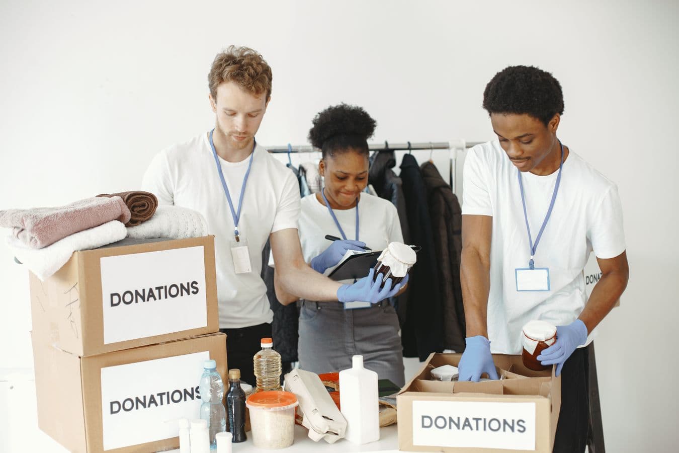 Volunteers packing boxes of donations for charity